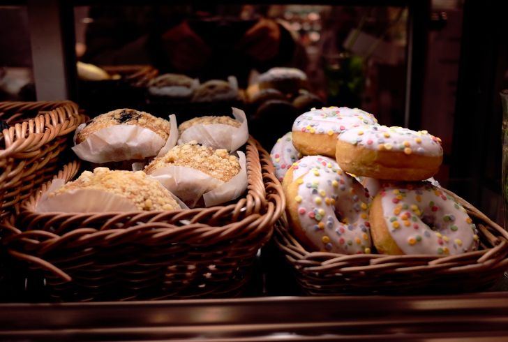 Miniature donuts arranged in a playful pattern