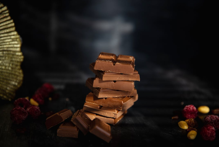 Indulge in a piece of dark chocolate, and you might just find yourself in a better mood